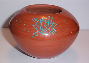 Red clay pot with incised turquoise turtle motif by Paul Speckled Rock.jpg