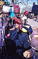 ASC Leiden - W.E.A. van Beek Collection - Dogon markets 21 - Women selling their beer warn the photographer that he also has to buy some, Tireli, Mali 1989