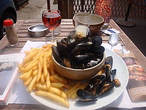 Moules frites wth rose and pastis