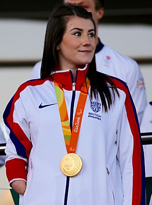 Hollie Arnold with Paralympic gold medal.jpg