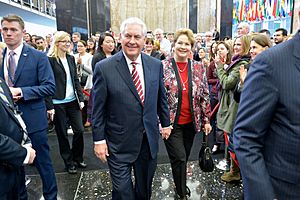 Secretary Tillerson and Mrs. St. Clair Walk Through the State Department's Main Lobby on his First Day (32516939282)