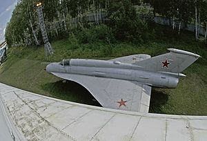 Aircraft Mig-21I under the wing of the plane Tu-144 (9678535680)