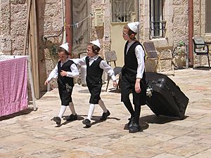 Toldos Aharon kids prepare for Shabbat, Mea Shearim, Jerusalem