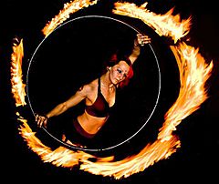 Fire Gypsy performing with a fire hula hoop