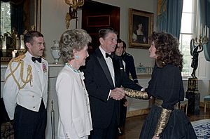 President Ronald Reagan and Nancy Reagan greeting Jaclyn Smith