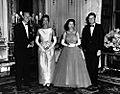 Queen Elizabeth and Prince Philip host Queen's Dinner for President and Mrs. Kennedy