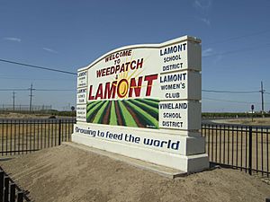 Welcome sign for Weedpatch and Lamont, California, 2012