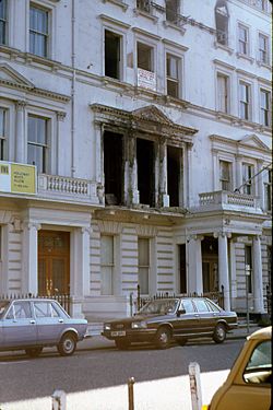 Photograph of the front of a fire-damaged building
