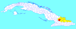 Cacocum municipality (red) within  Holguín Province (yellow) and Cuba