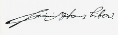 signature written in ink in a flowing script