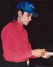 Michael Jackson gives autograph - supercropped