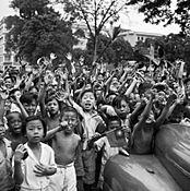 Children cheering the arrival of the 5th Indian Division in Singapore, 5 September 1945. SE4662