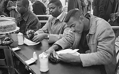 Civil Rights protesters and Woolworth's Sit-In, Durham, NC, 10 February 1960. From the N&O Negative Collection, State Archives of North Carolina, Raleigh, NC. Photos taken by The News & (24495308926).jpg