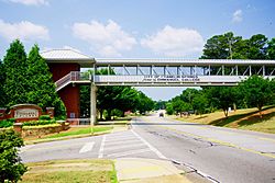 Pedestrian bridge over US 29; entrance to Emmanuel College on the left