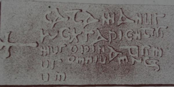King Cadfan's gravestone in Llangadwaladr church.  The inscription reads "Catamanus rex sapientisimus opinatisimus omnium regum" (English: King Cadfan, most wise and renowned of all kings).