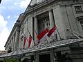 National Flags at half-staff for the death of Lee Kuan Yew at The Fullerton Hotel Singapore - 20150327