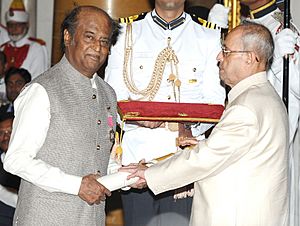 The President, Shri Pranab Mukherjee presenting the Padma Vibhushan Award to Shri Rajinikanth, at a Civil Investiture Ceremony, at Rashtrapati Bhavan, in New Delhi on April 12, 2016