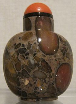 Chinese snuff bottle, c. 1750-1850, puddingstone bottle with coral and glass stopper, Honolulu Museum of Art
