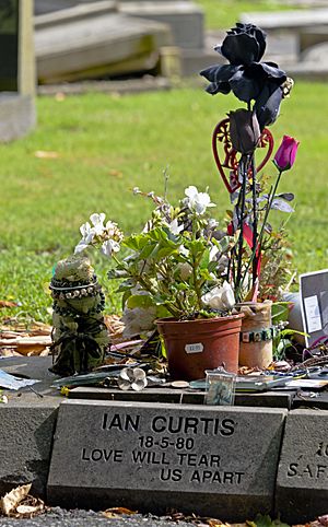 Ian Curtis grave marker with mementoes