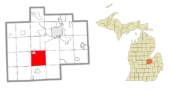 Location within Saginaw County (red) and an administered portion of the village of St. Charles (pink)