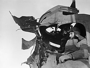 Damage to the director of the destroyer HMS SAUMAREZ which received a direct hit from an 11-inch shell during the Battle of North Cape, when the German battlecruiser SCHARNHOST was sunk on 10 January 1943. A21314