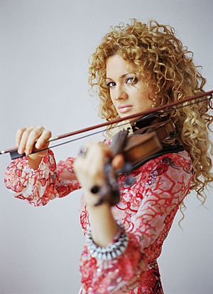 Miri Ben-Ari with Violin 47b.jpeg