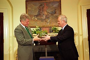 President Bill Clinton receives a traditional crystal bowl of Shamrocks from Prime Minister John Bruton of Ireland