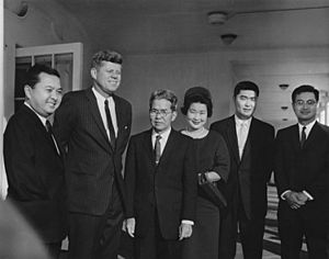 President John F. Kennedy with Daniel Inouye and his family in the West Wing Colonnade