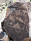 Petroglyphs on a large rock at Petroglyph National Monument
