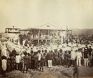 Reading the proclamation of annexation, Mr Lawe's house, Port Moresby, New Guinea, November 1884 - photographer John Paine or Augustine E. Dyer (5708761723)