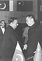 Huseyn Shaheed Suhrawardy and Zhou Enlai signing the Treaty of Friendship Between China and Pakistan in Beijing