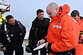 Members of the Royal Canadian Mounted Police and the Canadian Border Services Agency share information on the survey research vessel Strait Hunter, simulating a migrant vessel, during Frontier Sentinel 2012 120508-N-IL267-072