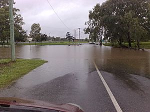 Churchill Drive flooded in Warwick