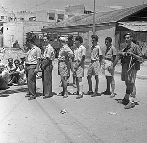 Jewish civilians waiting to be interrogated July 1946