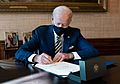 President Joe Biden signs H.R. 335