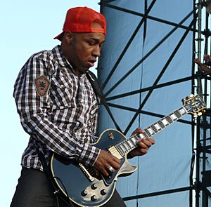 Johnson onstage playing guitar