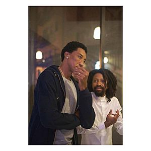 Genesis and Scottie Pippen talking about his artwork during his Through the Grey exhibition