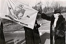 Lilly Catherine Stone with first Montgomery County flag, 1944