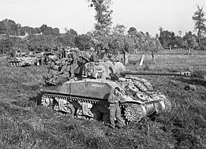 Sherman Firefly awaiting orders to move forward Operation Goodwood July 1944