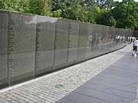 Wall of black granite engraved with names