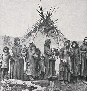 Naskapi women, wearing woolen ad deerskin clothing