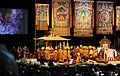 His Holiness the 14th Dalai Lama praying in the pavilion, closing the Kalachakra mandala and offering flowers, monks, thangkas, throne, photographer, security officers, sponsors, Verizon Center, Washington D.C., USA (5956316522)