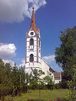 Reformed church in Radnót from the garden.jpg