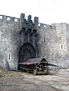 Burnt-out castle gate and battering ram