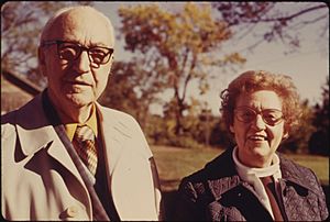 DR. AND MRS. KARL MENNINGER ATTENDING THE SECOND ANNUAL TALLGRASS PRAIRIE NATIONAL PARK CONFERENCE HELD AT ELMDALE... - NARA - 557149