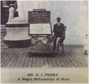 E. J. Perry, to the right of his booth, in 1905