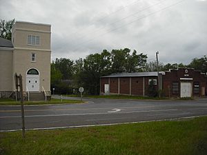 A view of Stull looking southwest. The building on the left is the Stull United Methodist Church, and the building on the right is the fire station.
