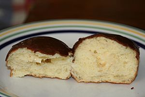 Boston cream doughnut bisected