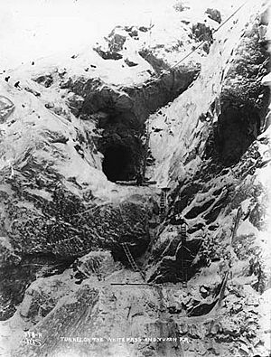 Construction of the only tunnel on the White Pass and Yukon Railroad, Tunnel Mountain, Alaska, ca 1899 (HEGG 72)