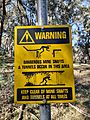 Mine shaft warning sign located in Italian Gully Lake Eildon National Park 2022